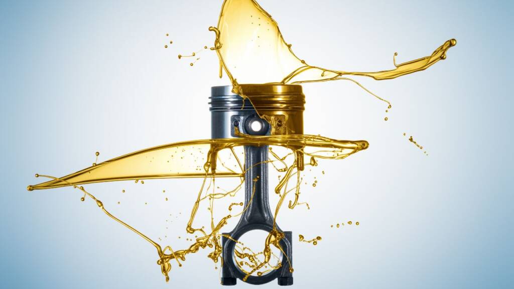 Obrazek przedsatwia olej silnikowy, który sie artystycznie rozlewa i tworzy różne wzory